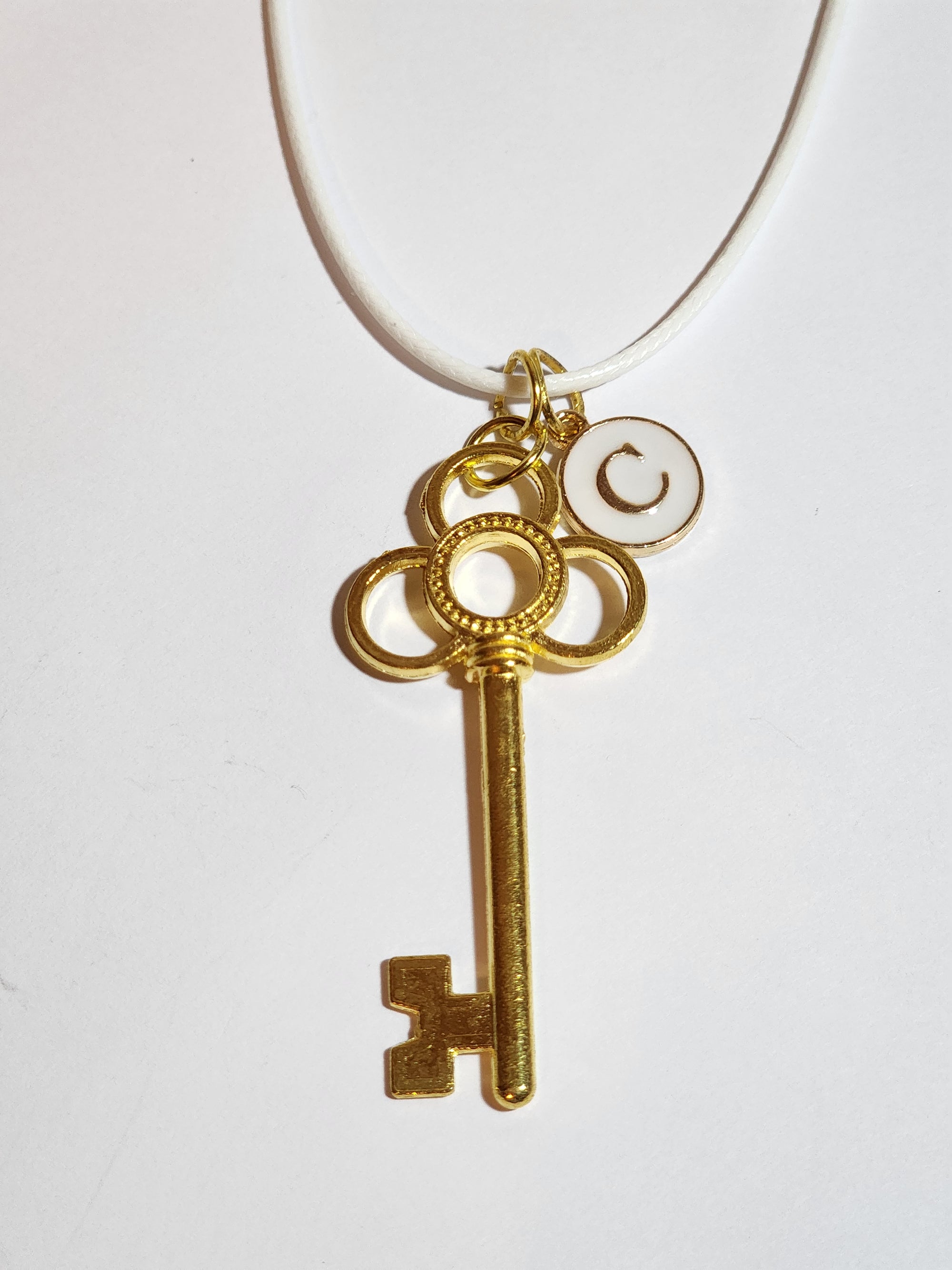 Gold club key necklace with letter