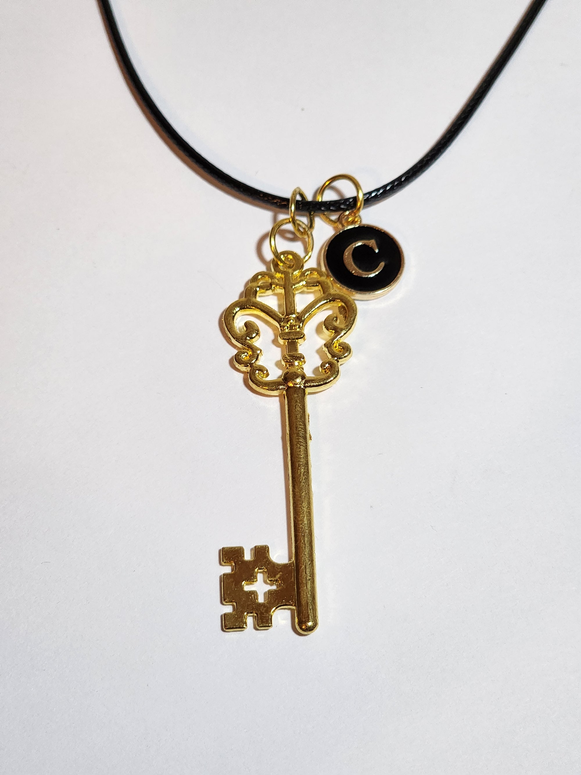 Elegant key necklace with letter