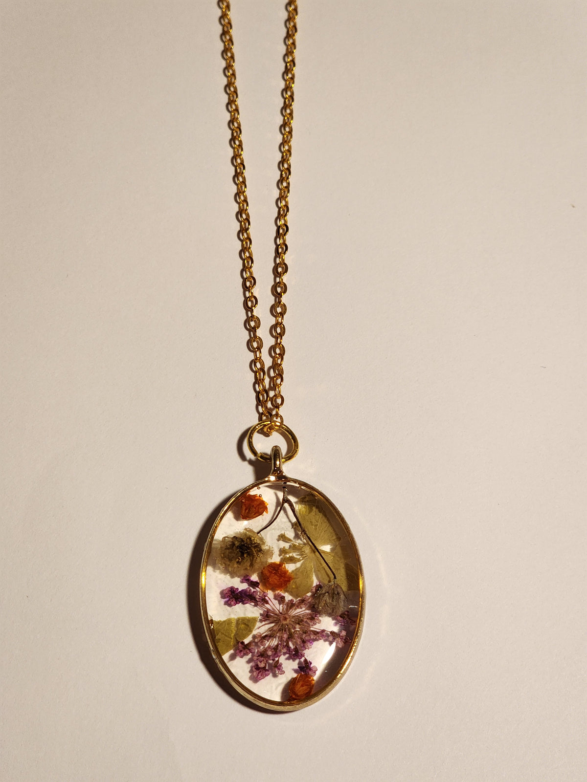 Oval flower pendant