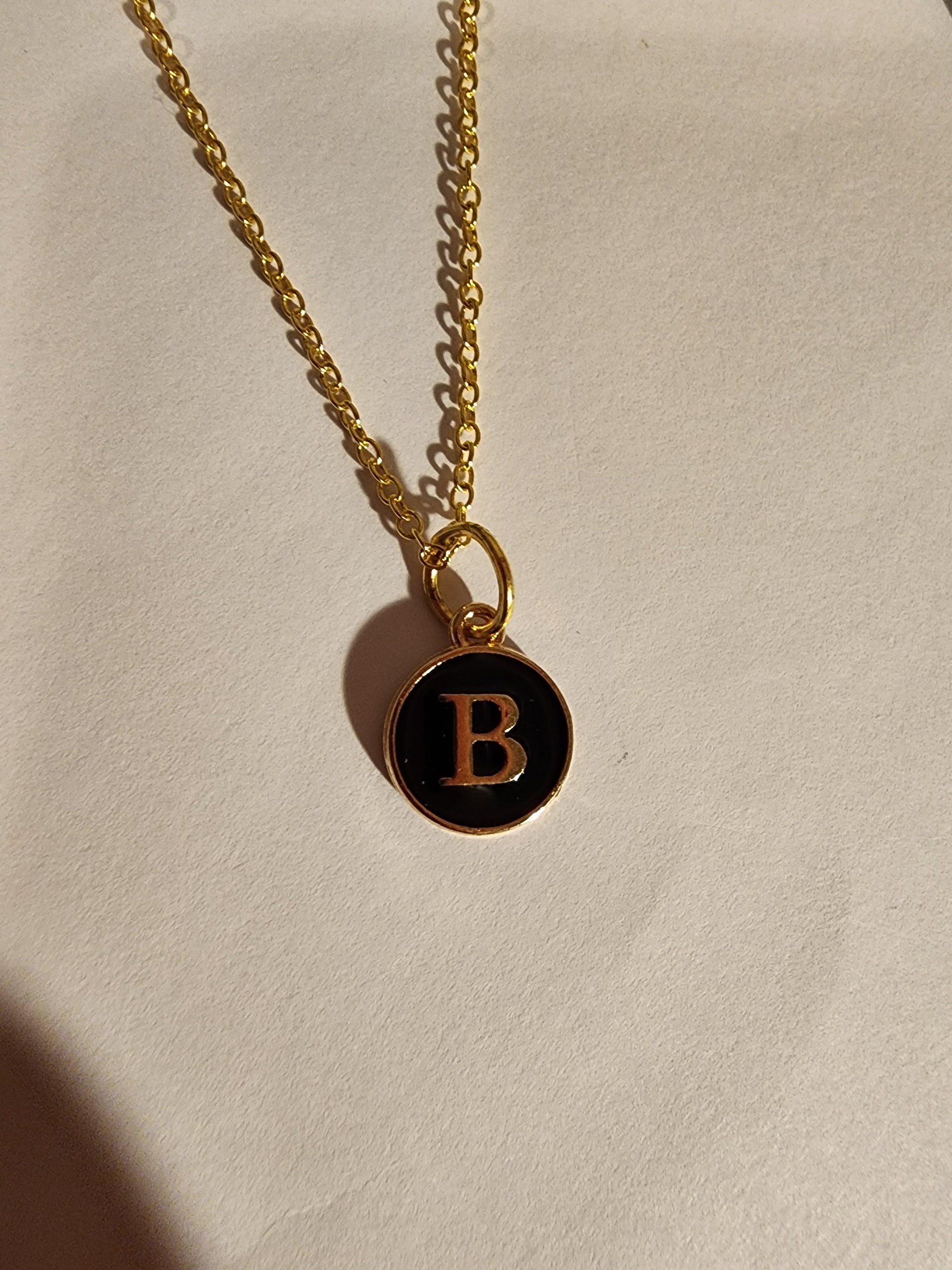 Small round initial letter necklace