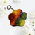 Rainbow colored paw print keychain